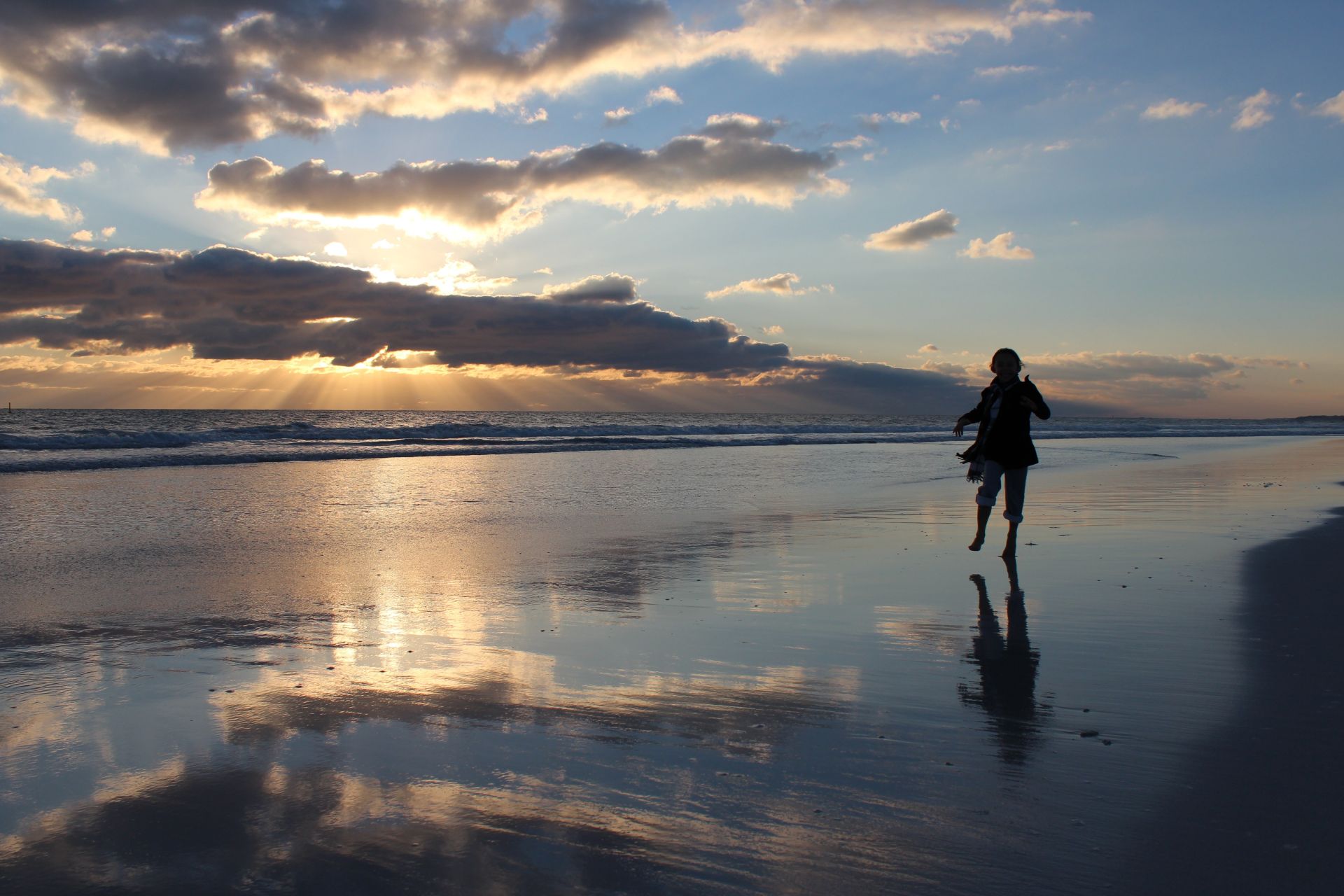 Silhouette On The Beach