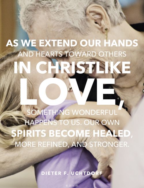 A photograph of a woman and child, paired with a quote by President Dieter F. Uchtdorf: “As we extend our hands … in … love, … our own spirits become healed.”