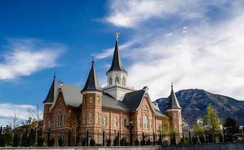 Exterior of the Provo City Center Temple on a partly cloudy day.