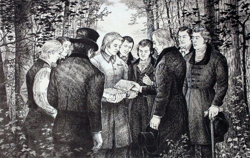 A black-and-white drawing by Olinda Reynolds of a man standing and holding the gold plates open, with eight men surrounding him and looking down at the plates.