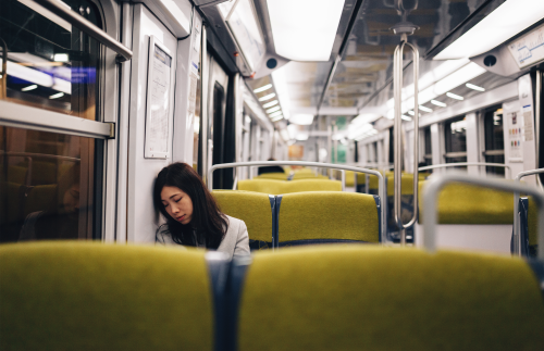 Girl Sleeping on Train