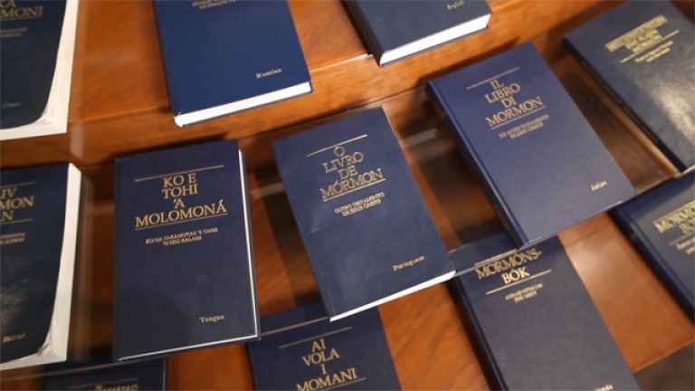 Many Books of Mormon in different languages displayed