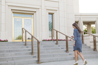 youth walking to temple entrance