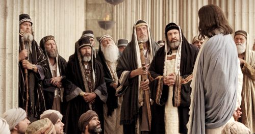 Jesus talking to Pharisees in Jerusalem. Movie still from The Life of Jesus Christ Bible Videos.