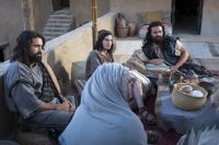 Lehi's family talking at their home at Jerusalem