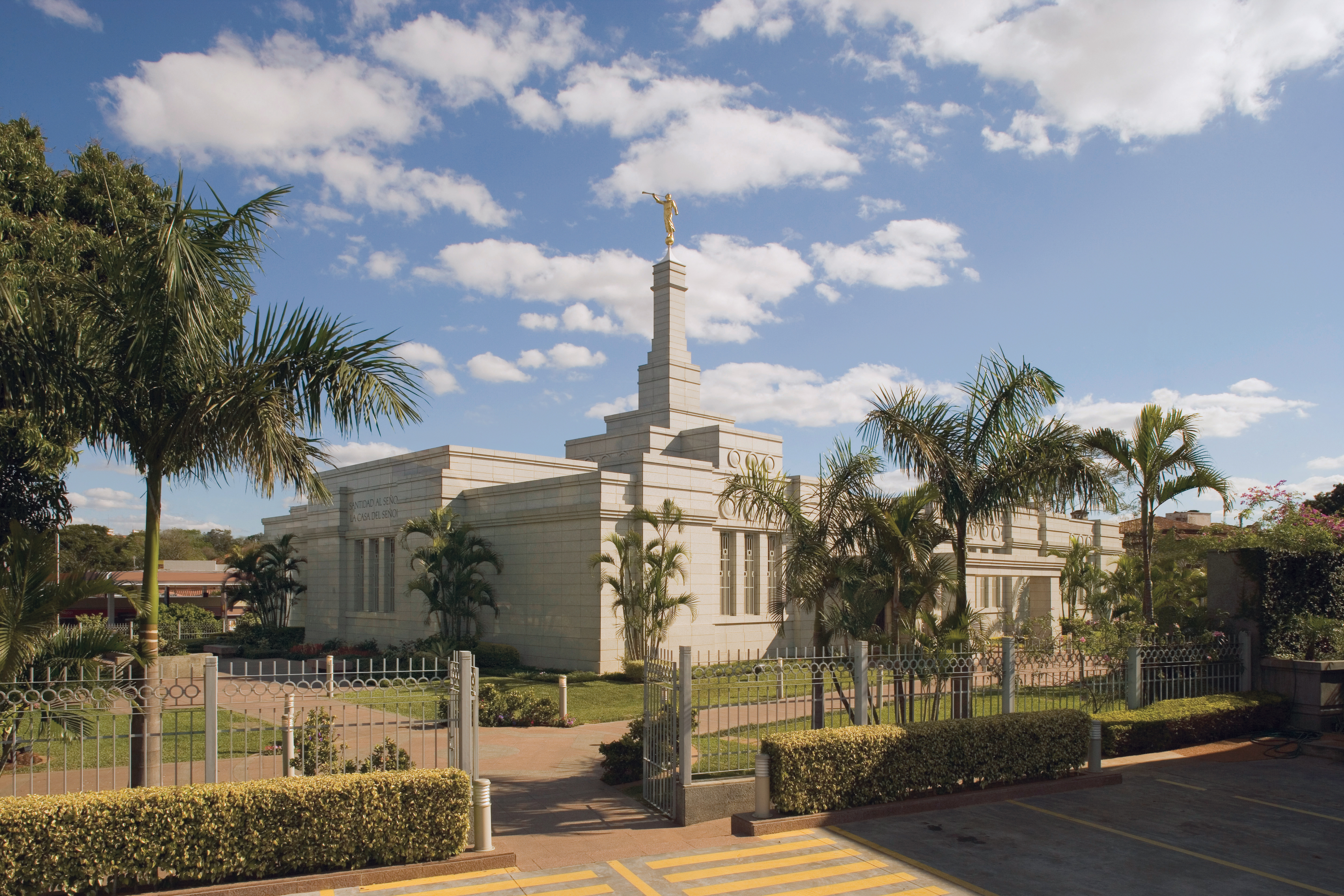 A view of the Asunción Paraguay Temple during the daytime, with the gate open to the grounds.
