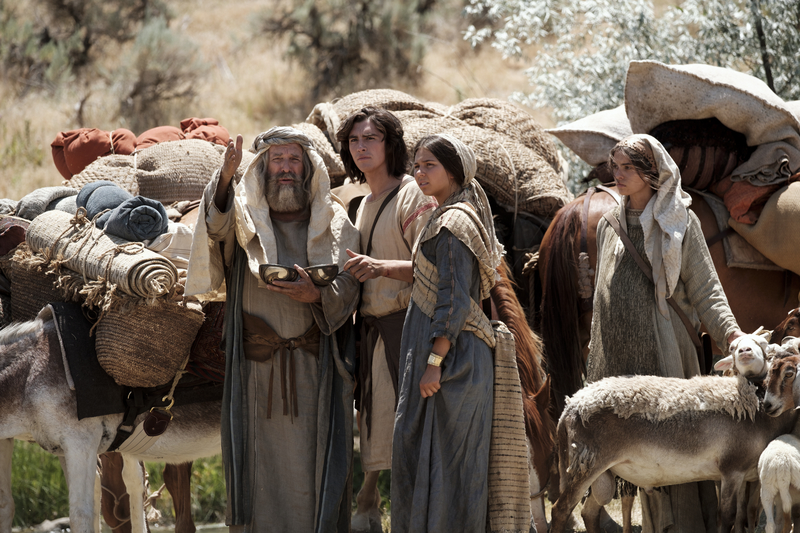 Lehi's family using the Liahona for direction