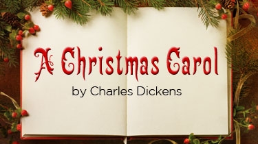 An open book with a Christmas border.  The words "A Christmas Carol by Charles Dickens"  are written on the book.