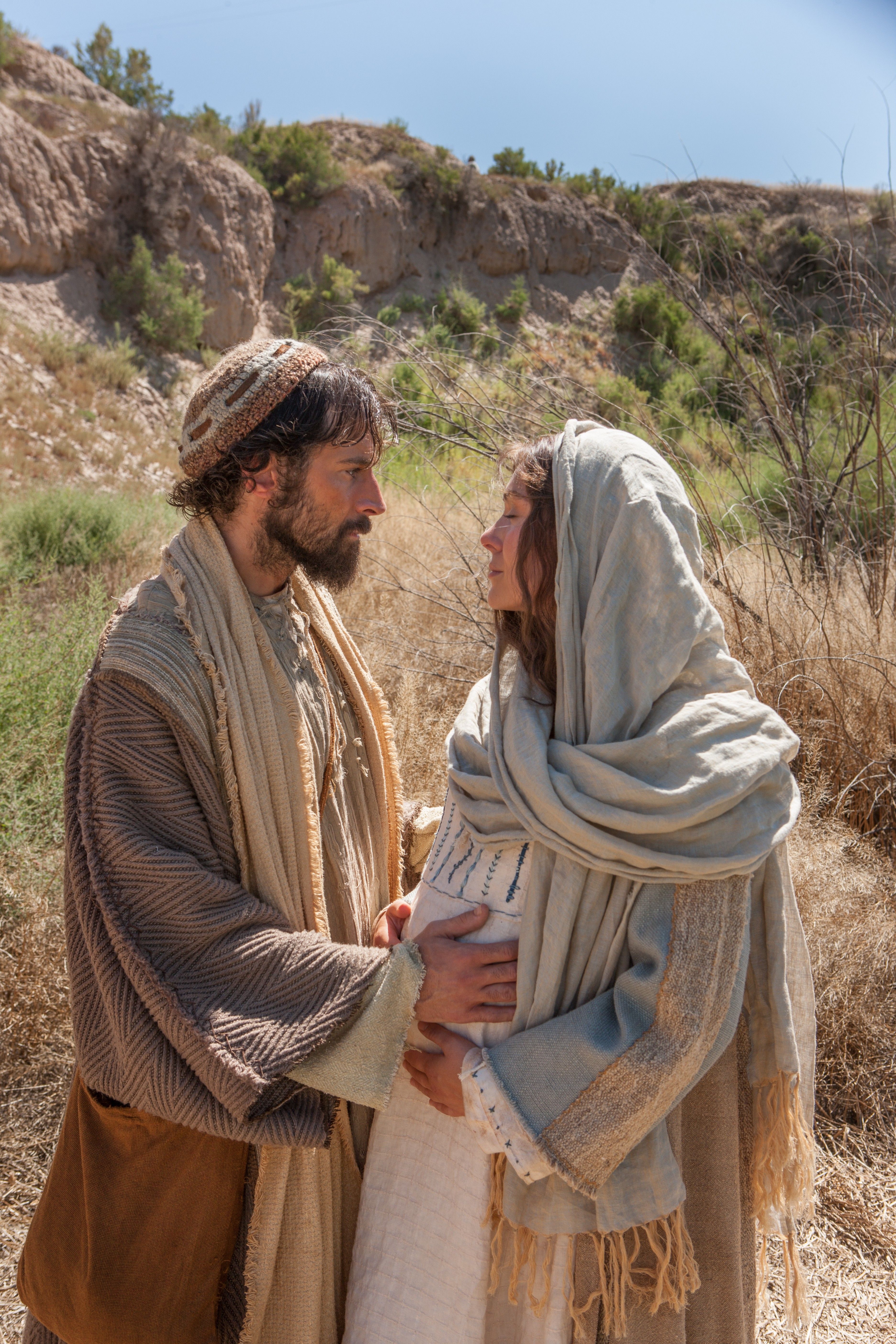 Mary and Joseph stop to rest on their journey to Bethlehem.