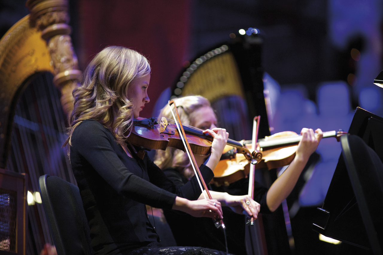 A Woman Playing a Violin