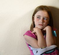 LONELINESS AND DISCOURAGEMENT , PRIMARY AGE GIRL