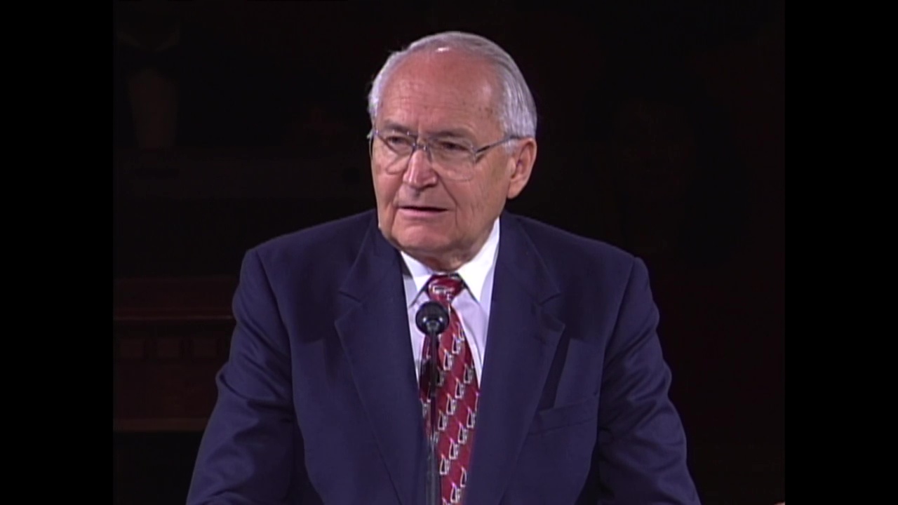 L. Tom Perry speaks from a pulpit