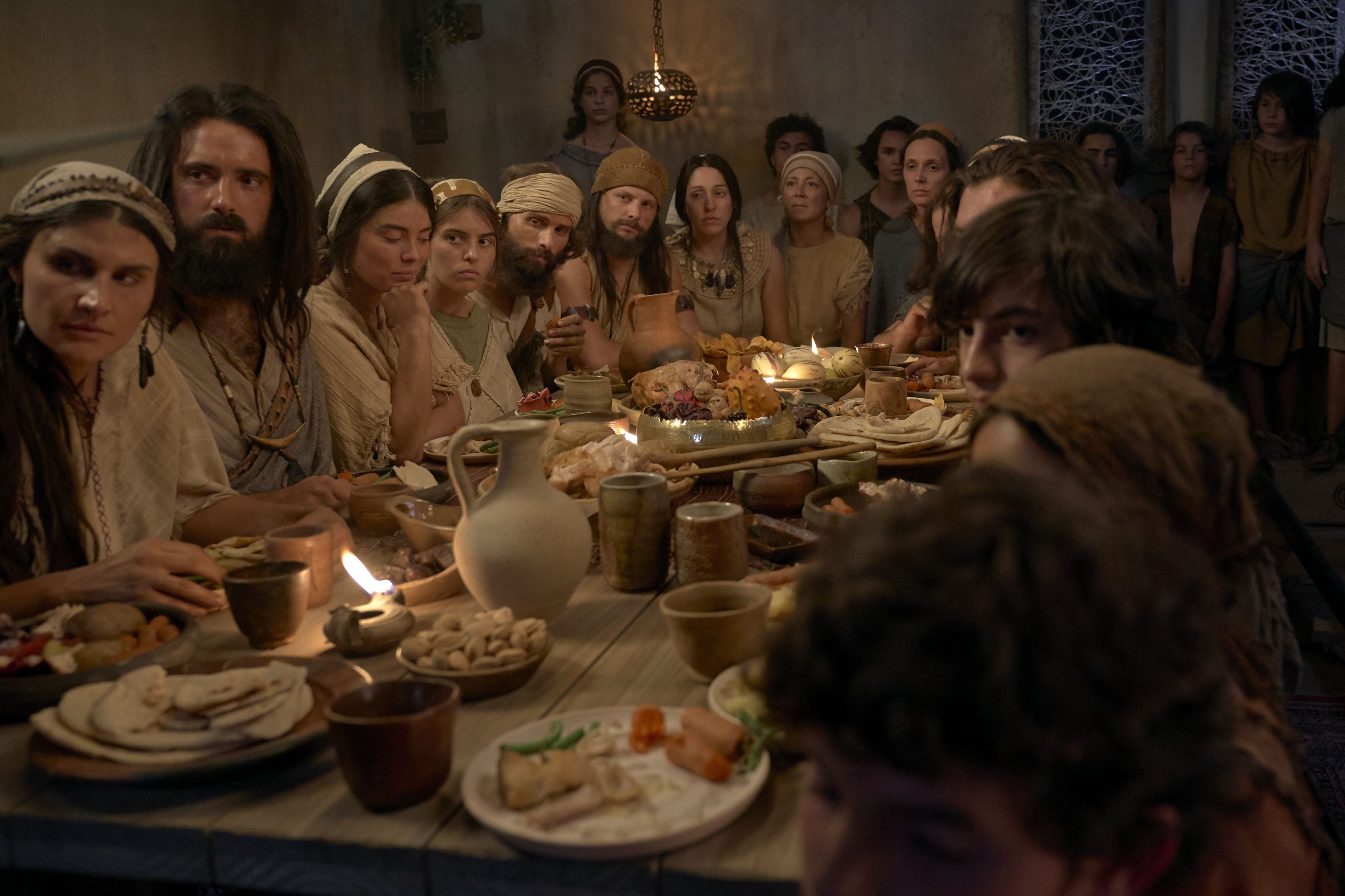 Lehi’s family listening to him teach while dining