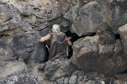 Moroni, son of Mormon, enters the cavity of a rock to shelter for the night.
