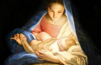 Mary the mother of Jesus takes her newborn Son and wraps Him in swaddling clothes