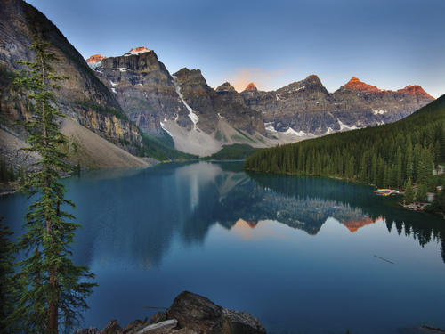 A view of Moraine Lake in Canada at sunrise.