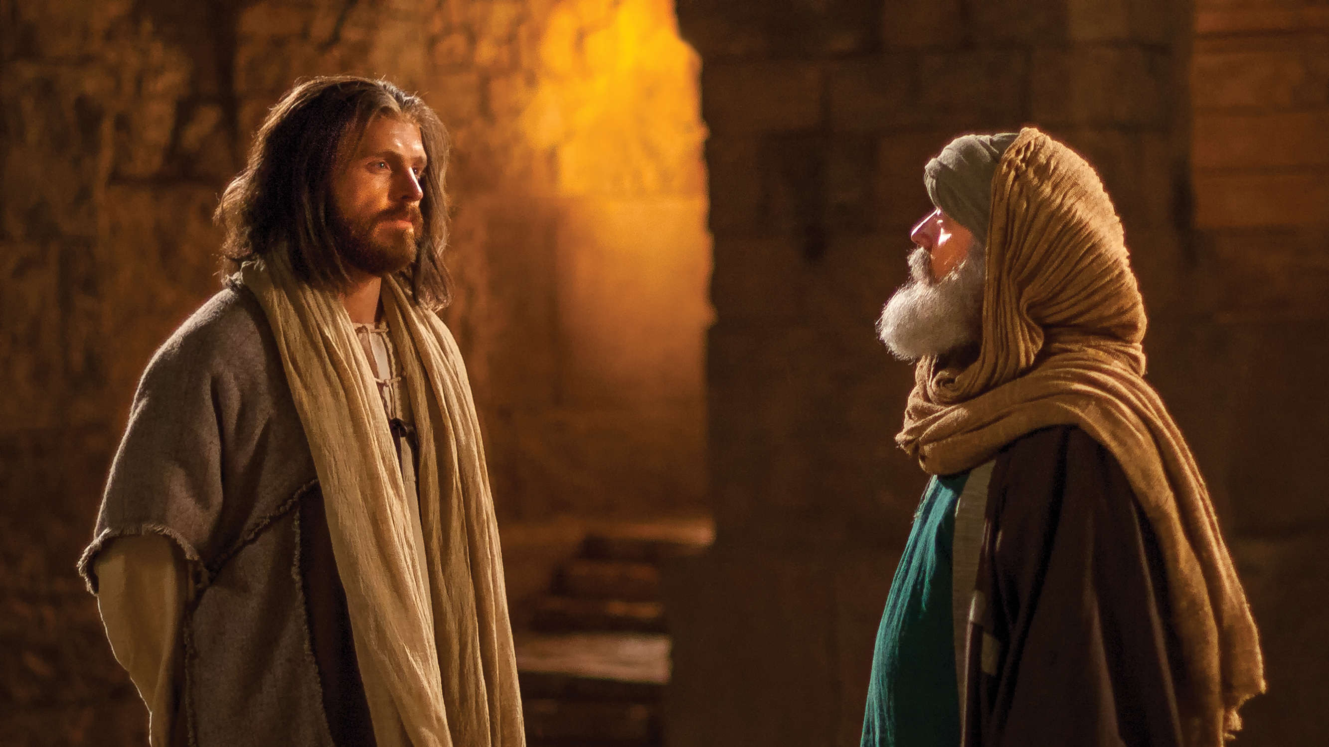 Jesus standing and speaking with Nicodemus.