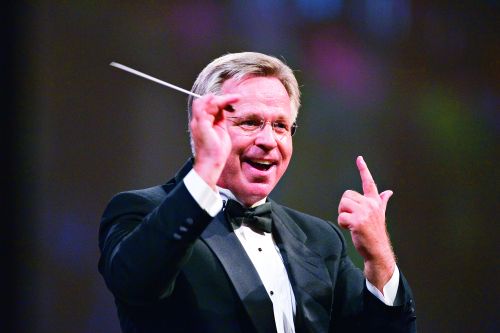 Craig Jessop conducting the Mormon Tabernacle Choir and Orchestra at Temple Square at President Gordon B. Hinckley's 95th birthday celebration, "A Celebration of Life," held in the Conference Center, July 2005.