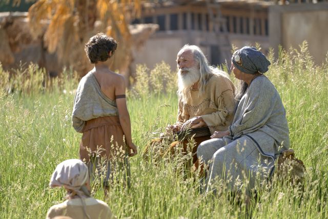 Lehi and Sariah teaching Joseph