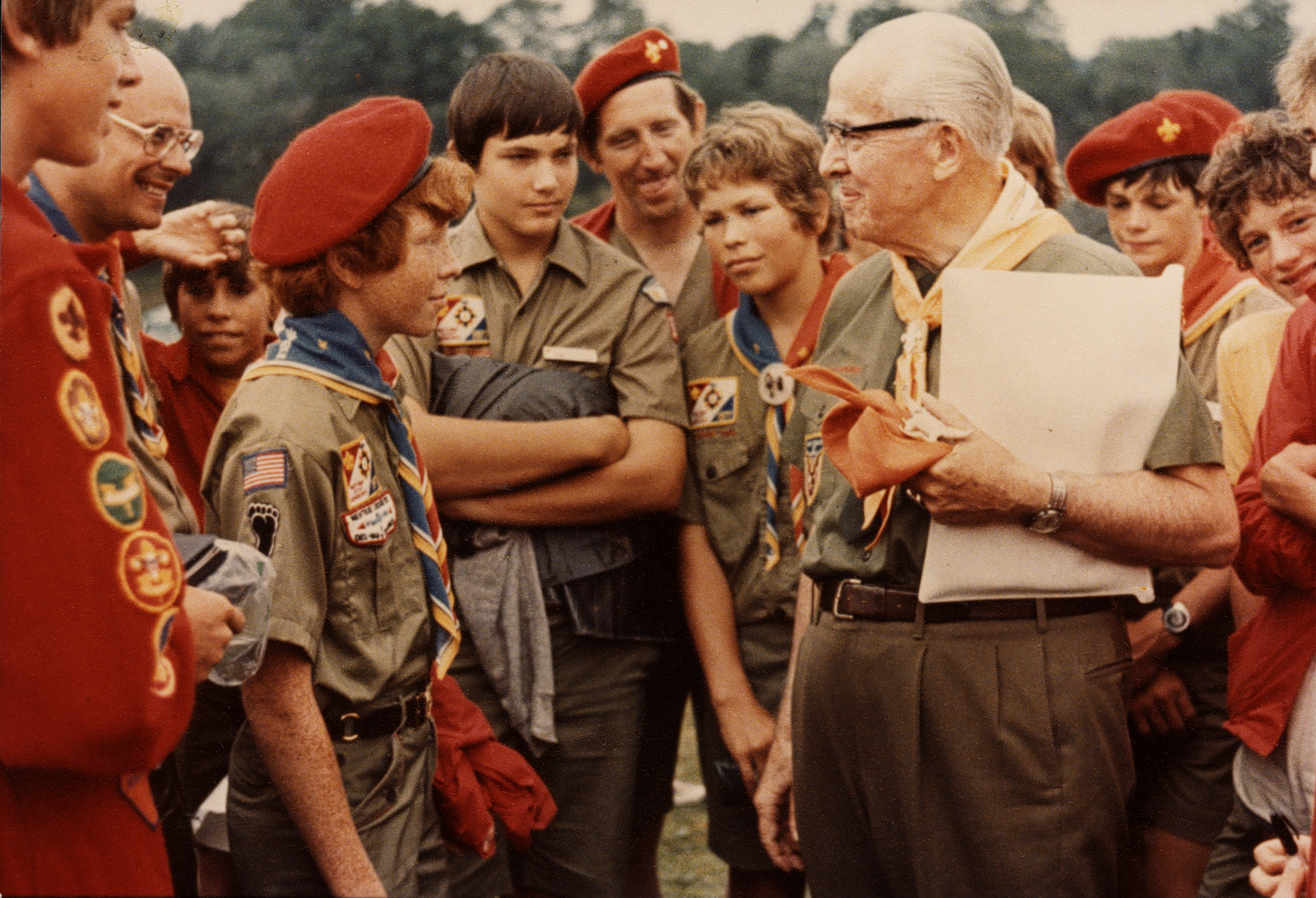 Ezra Taft Benson with Boy Scouts.

Collection includes images of Benson, members of his family, and his activities as member and president of Quorum of Twelve (1943-1985), U.S. Secretary of Agriculture (1953-1961), and President of the Church (1985-1993). Bulk of collection consists of photographs taken while he was in government service

Collection includes print-outs of computerized "index" (inventory) of images prepared by members of Benson's staff. Entry for each of 919 numbered folders lists items in that folder, date(s) of images, and persons or subjects represented