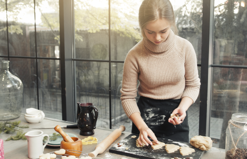 Woman decorating cookies