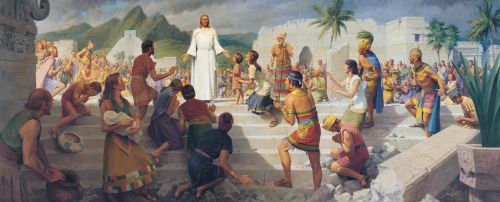 A panoramic view of Jesus Christ standing in white robes on a flight of steps while Book of Mormon–era people gather around to see.