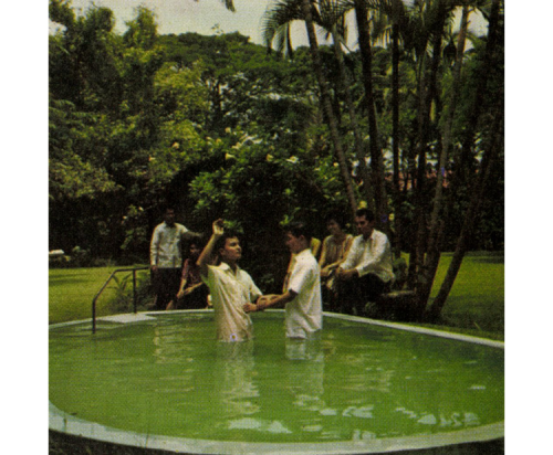Baptism being performed