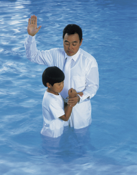 Boy Being Baptized