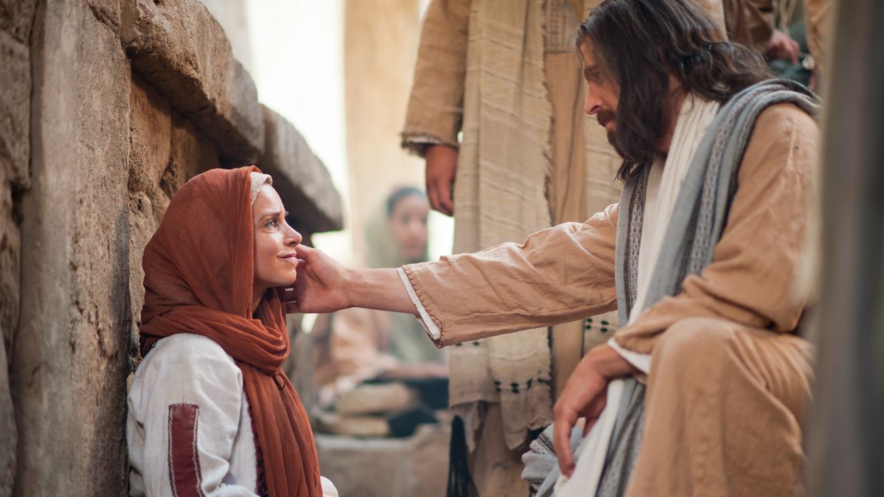Jesús consuela a una mujer